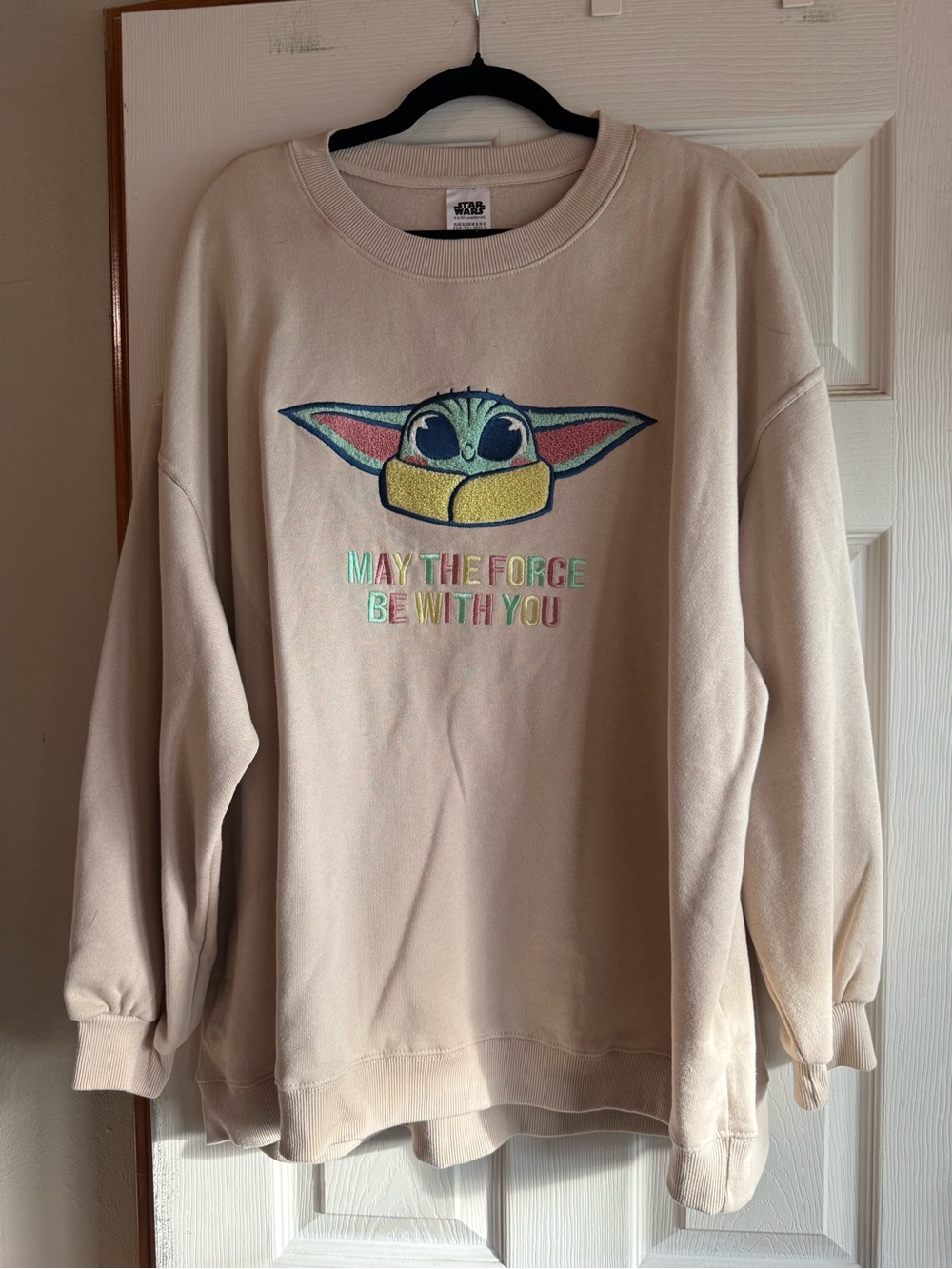 Star Wars womenโs Beige 'The Child' Graphic Sweatshirt